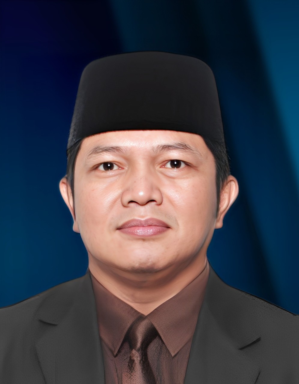 Dr. Dadang Solihat, M.Pd